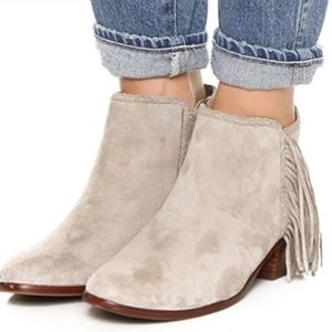 Dark gray suede low boot with fringe on side